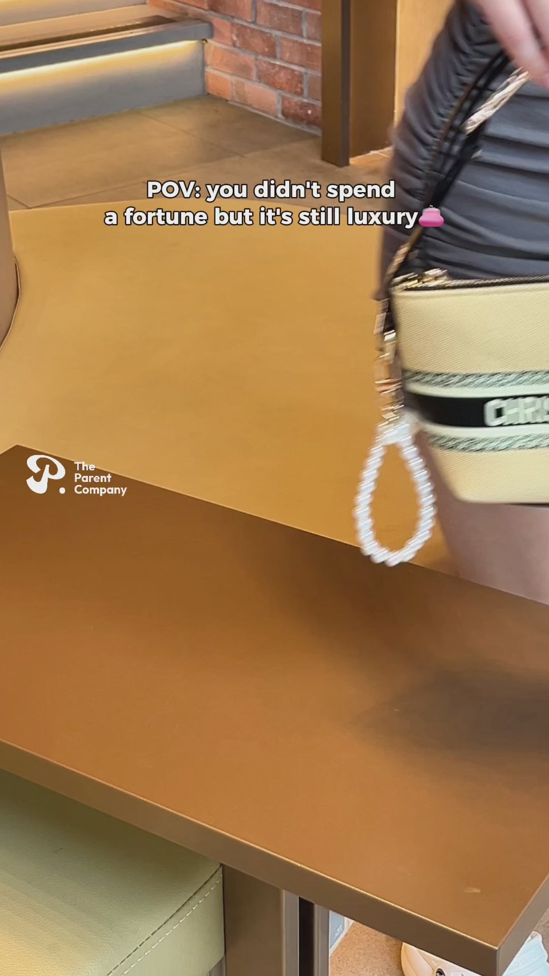 Load video: Dior Christian Dior Handbag with Leather Strap + Pearl Charm Keychain - Beige